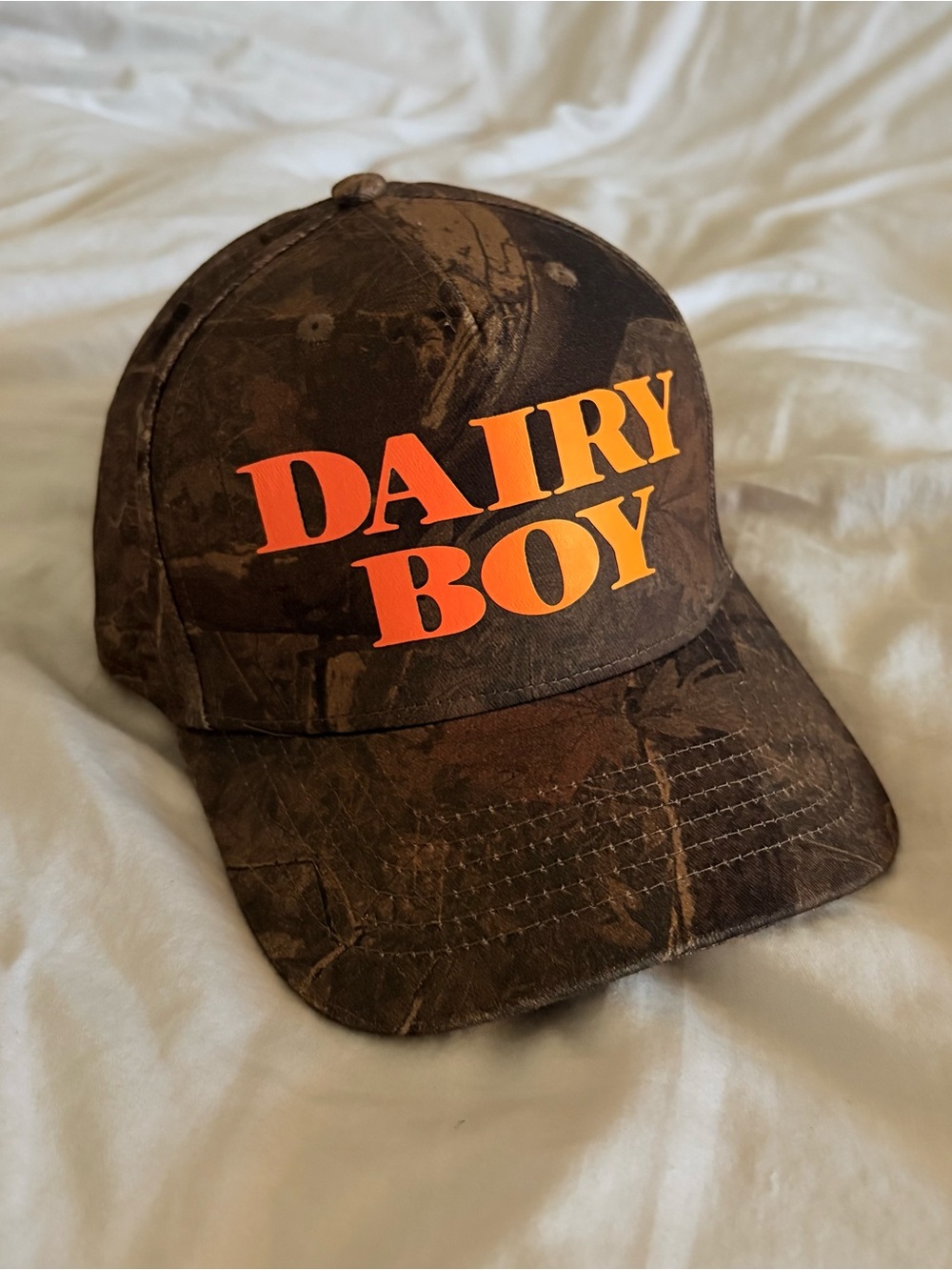 Dairy Boy Camo Orange Hat